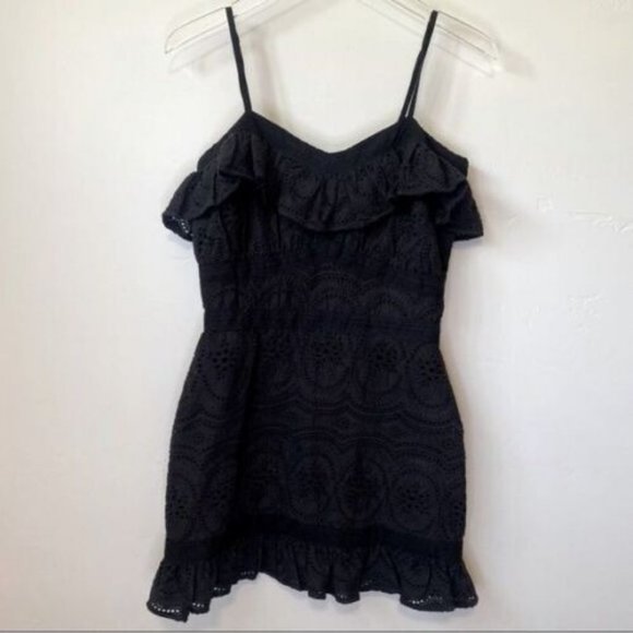 Fully lined Adjustable straps Embroidered eyelet fabric Ruffled trim Hidden back - Picture 1 of 10